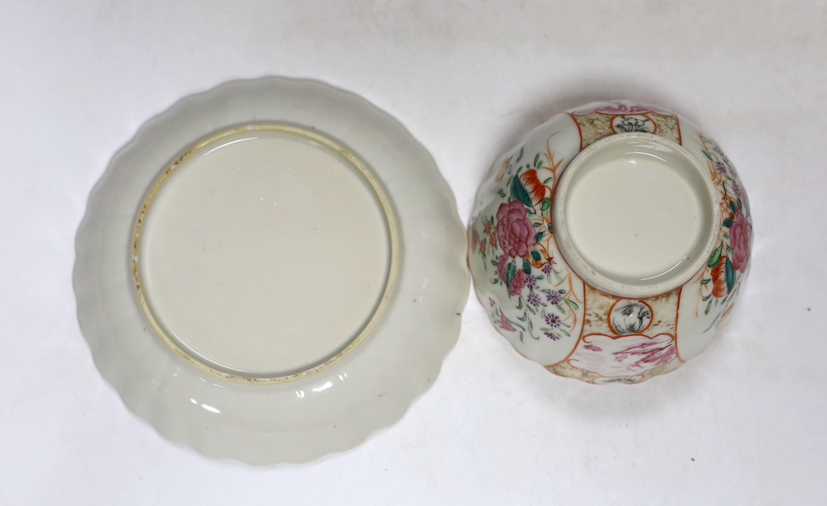 A Chinese famille rose bowl and dish and two similar bowls, all Qianlong period, largest diameter 23cm